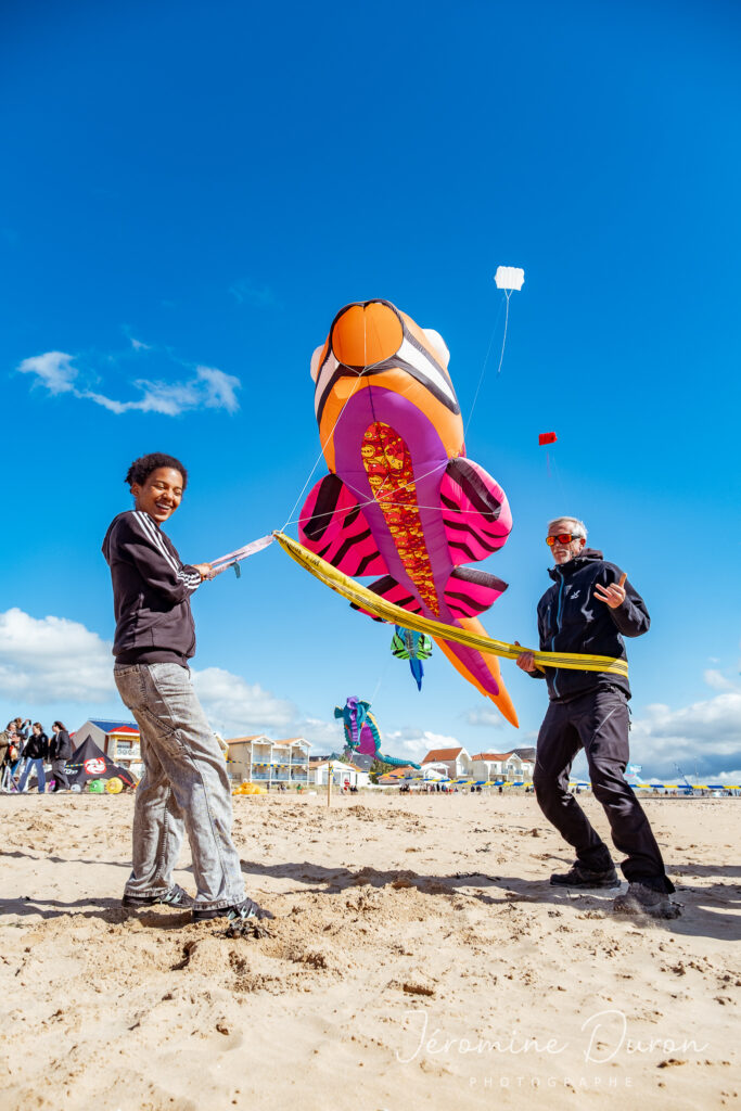 touriste cervoliste poisson cerf-volant xxl plage